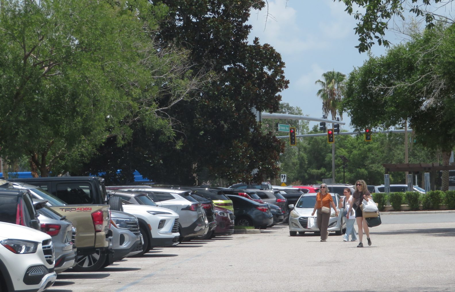 Cruising car waiting for shoppers returning to their vehicle